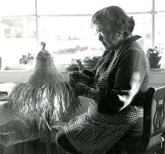 Florence Davidson weaving Spruce Root hat.