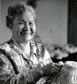 Grace Wilson weaving Spruce Root Hat