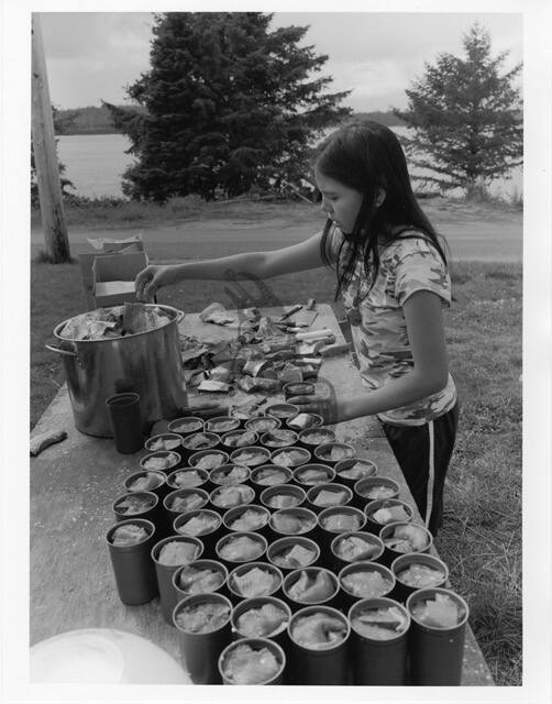 Young Girl Canning Fish in Old Massett