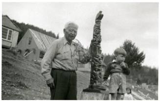 Arthur Moody with Argillite pole and child
