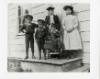 Young woman and children in Skidegate